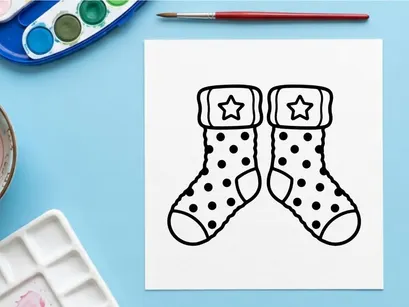 Pair of festive Christmas socks with stars and polka dots for holiday celebrations
