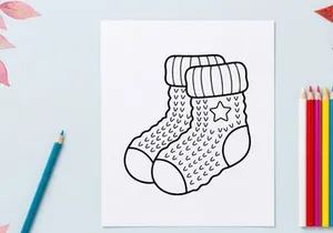Hand-drawn Christmas sock with star pattern and cuff for holiday gift decor and festive celebrations