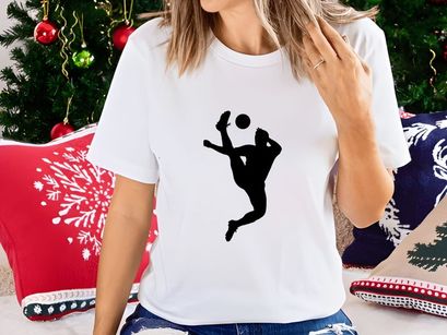 Silhouette of a person playing volleyball with dynamic movement and athleticism