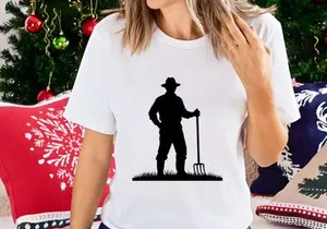Rural Farmer with Pitchfork in Grass Silhouette