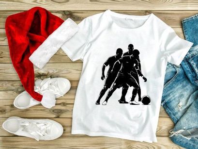 Silhouette of three soccer players in action with a ball