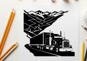 Semi truck silhouette driving on highway through mountain range
