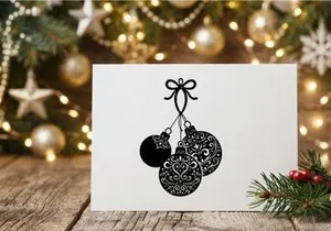Elegant Christmas ornaments with intricate patterns for holiday decor