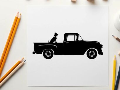 Silhouette of a dog in a classic pickup truck