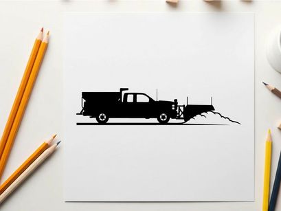 Silhouette of a truck plowing snow on a winter road