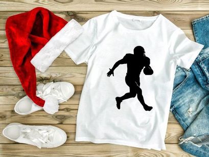 American football player running with ball in hand silhouette