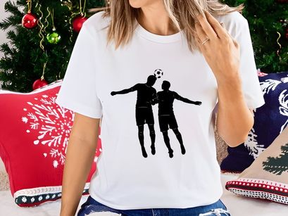 Two soccer players jumping to head a ball in mid air competition