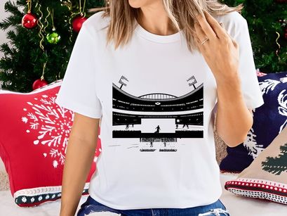 Soccer stadium with players in action under bright lights