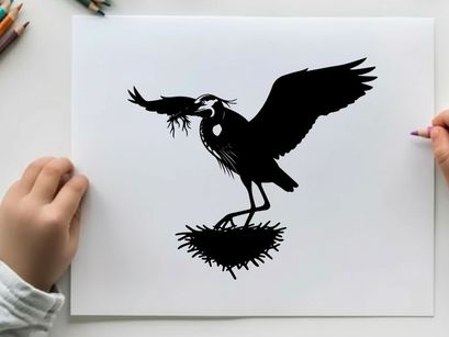 Silhouette of a bird building nest with twigs and branches