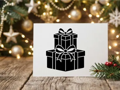 Kotak hadiah Natal hitam putih dengan pita dan busur