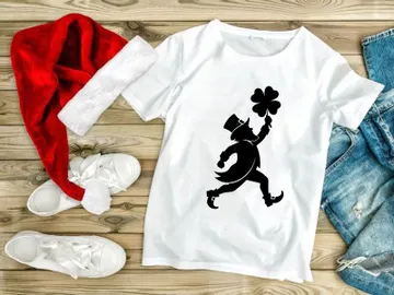 Businessman celebrating success holding four leaf clover luck symbol preview picture