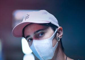 Guy in a Face Mask Mockup [Free PSD Download]