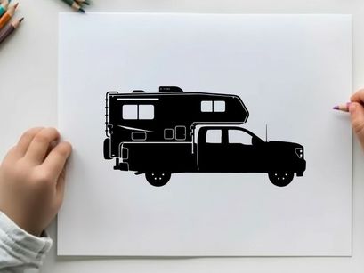 Silhouette of a pickup truck with camper
