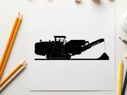 Silhouette of a large industrial crusher machine