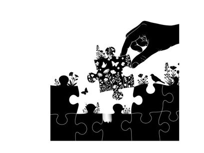 Silhouette of hand placing puzzle piece with floral pattern on white background