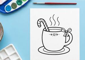 Hand-drawn steaming Christmas coffee cup with candy cane stirrer and love hearts design