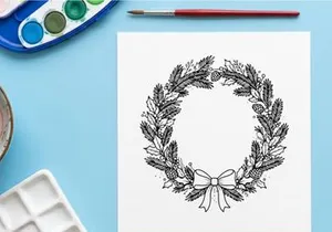 Hand drawn Christmas wreath with pine branches and bow isolated on white background