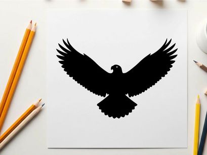 Black silhouette of an eagle in flight with wings spread wide