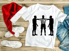 Referee separating two players in a sports conflict