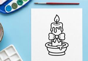 Hand-drawn Halloween candle with melting wax and bow. Spooky holiday doodle illustration for festive decor and crafts.