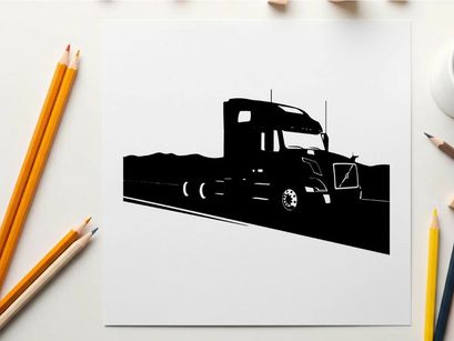 Silhouette of a semi truck driving on a highway with mountains