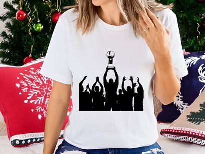 Silhouette of a group celebrating with a trophy