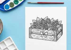 Handgezeichneter Geschenkkarton mit blauen Weihnachtsdekorationen und silbernem Band für Weihnachtsdekoration