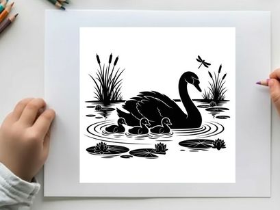 Mother swan and cygnets in pond silhouette