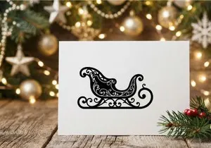 Black silhouette of a decorative Christmas sleigh isolated on a white background