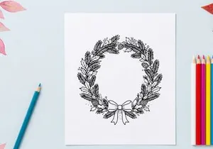 Hand drawn Christmas wreath with pine branches and bow isolated on white background
