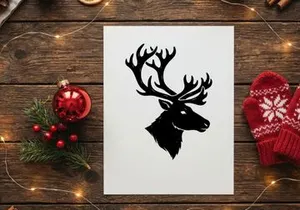 Black silhouette of a deer head with large antlers isolated on a white background.
