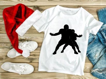 American football player tackling silhouette in action