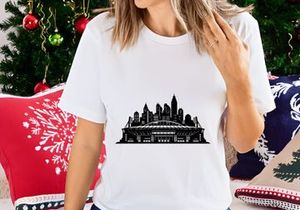 Black and white illustration of a city skyline with a large building