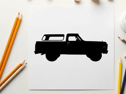 Silhouette of a classic pickup truck with a white background