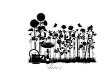 Silhouette of garden scene with flowers and birdbath silhouette