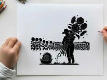 Silhouette of a farmer planting sunflowers in a field