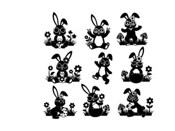 Black silhouette easter bunnies in flowers and grass preview picture