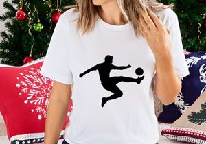 A soccer player kicking a ball in mid air with dynamic movement and skill