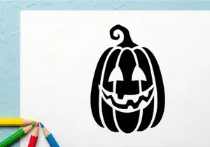 Halloween Pumpkin with Carved Face and Candlelight