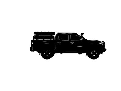 Silhouette of a pickup truck with a camper on the back