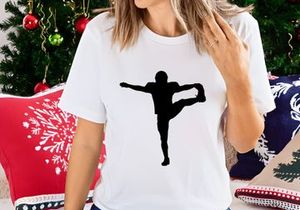Silhouette of a person performing a yoga or dance pose