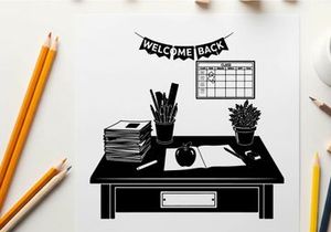 Silhouette of a desk with office supplies and welcome back banner