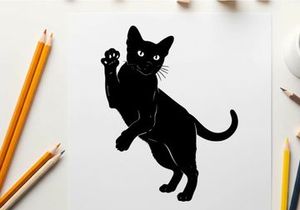 Black cat silhouette with paw raised in a playful pose silhouette