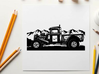 Vintage truck silhouette against majestic mountains