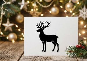 Black silhouette of a majestic reindeer with large antlers isolated on white background