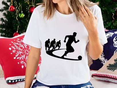 Silhouette of soccer players in action kicking ball with motion trail