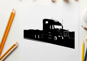 Silhouette of a semi truck driving on a highway with mountains