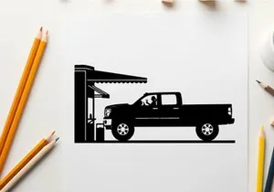 Silhouette of a pickup truck refueling at a gas station