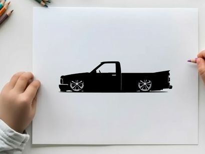 Silhouette of a lowered pickup truck with custom wheels
