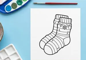 Hand-drawn striped Christmas sock with festive knit pattern and toe detail isolated on white
